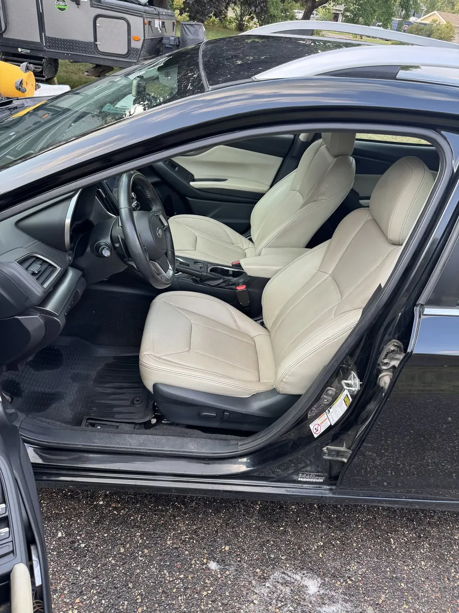 The same front vehicle interior after detailing